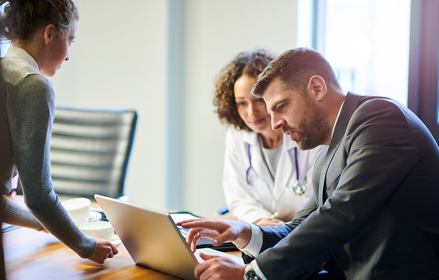 female doctor and male financial advisor speaking
