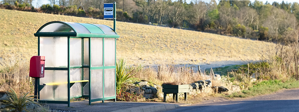 Social Determinants of Health Studies-blog-images_001 a bus stop in a rural area