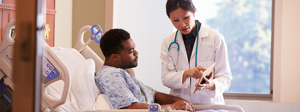 patient discussing post-discharge expectations with healthcare professional