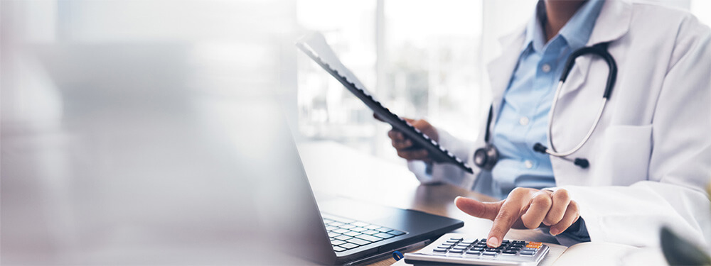 CY 2025 OPPS Final Rule Summary (MBG-046)-blog-image_1 Physician reviewing Physician Fee Schedule (PFS)